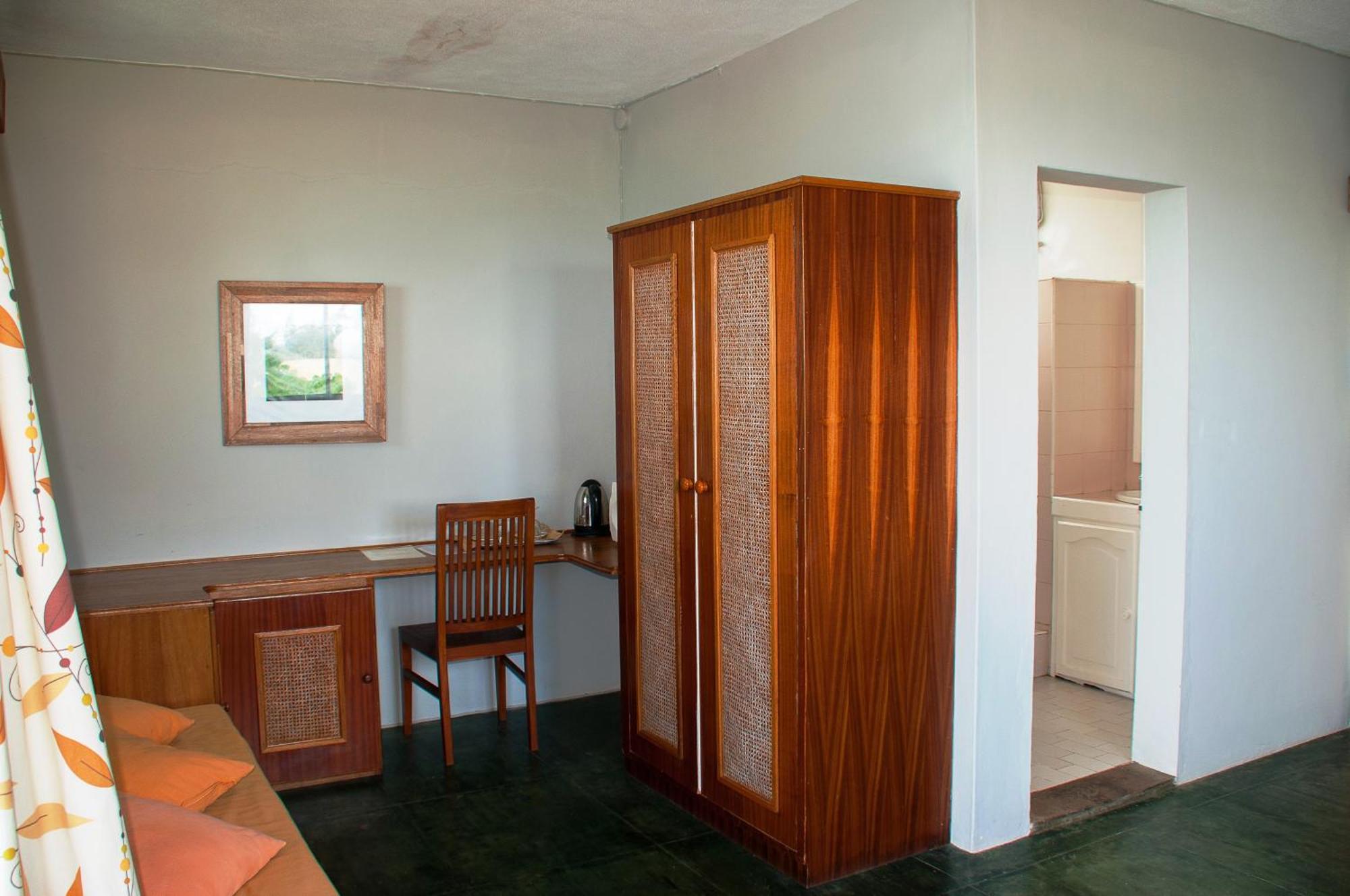 Chantauvent Guest House Blue Bay Quarto foto