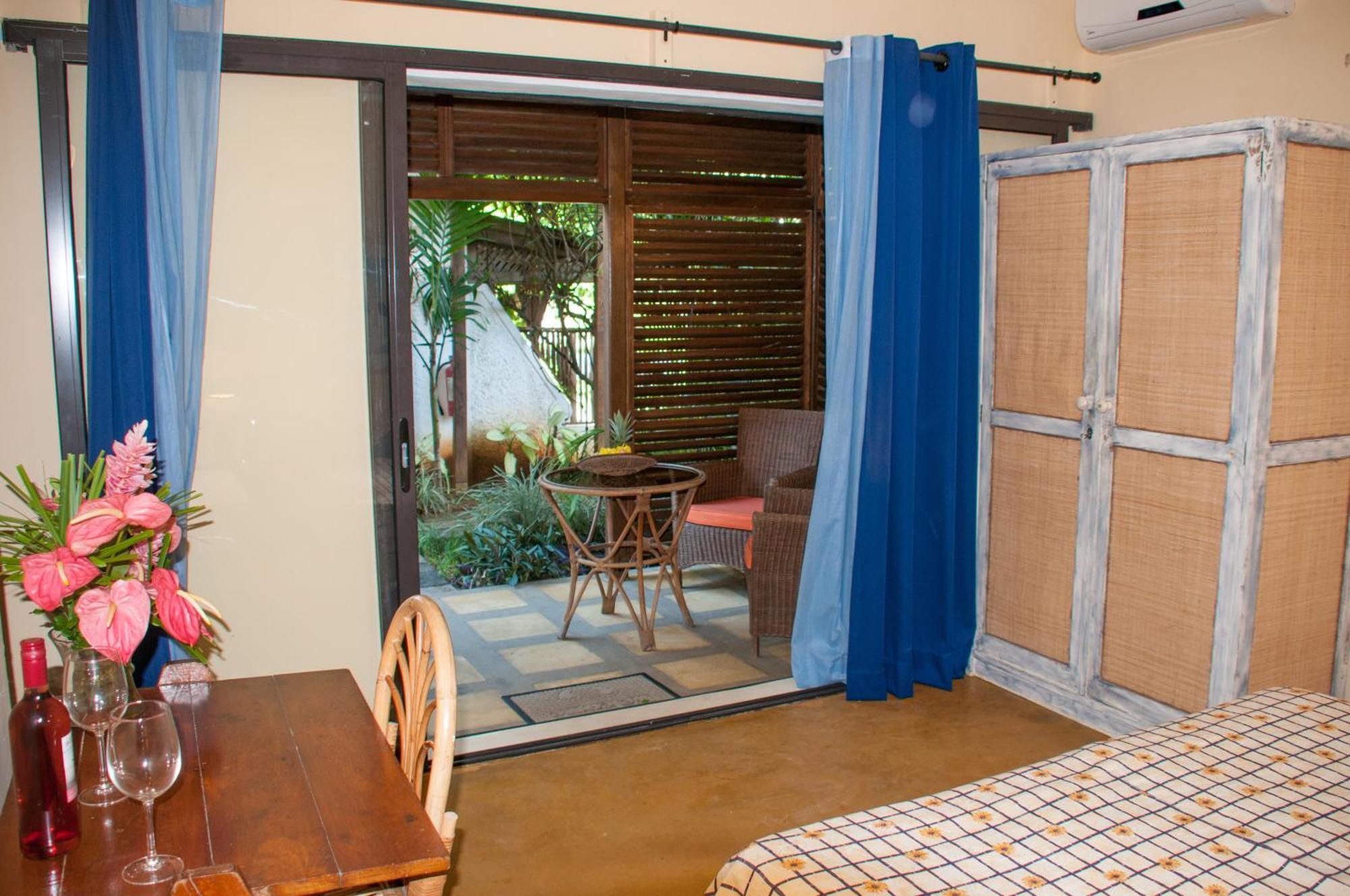 Chantauvent Guest House Blue Bay Quarto foto